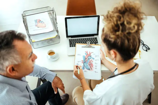 Doctor speaking with patient